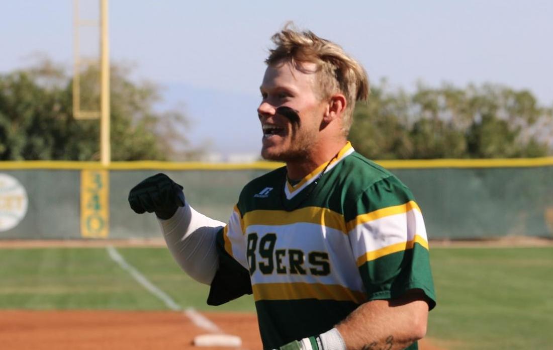 Preston Godfrey heads to Central Dugout after early opposite field home run in game two.