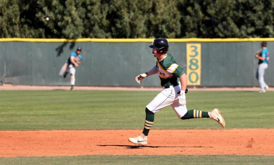 Ryan Ball with Friday afternoon double. He also homered in Saturday night's game. The Vaqueros won both. - Photo from Oscar Perez Pinal Central
