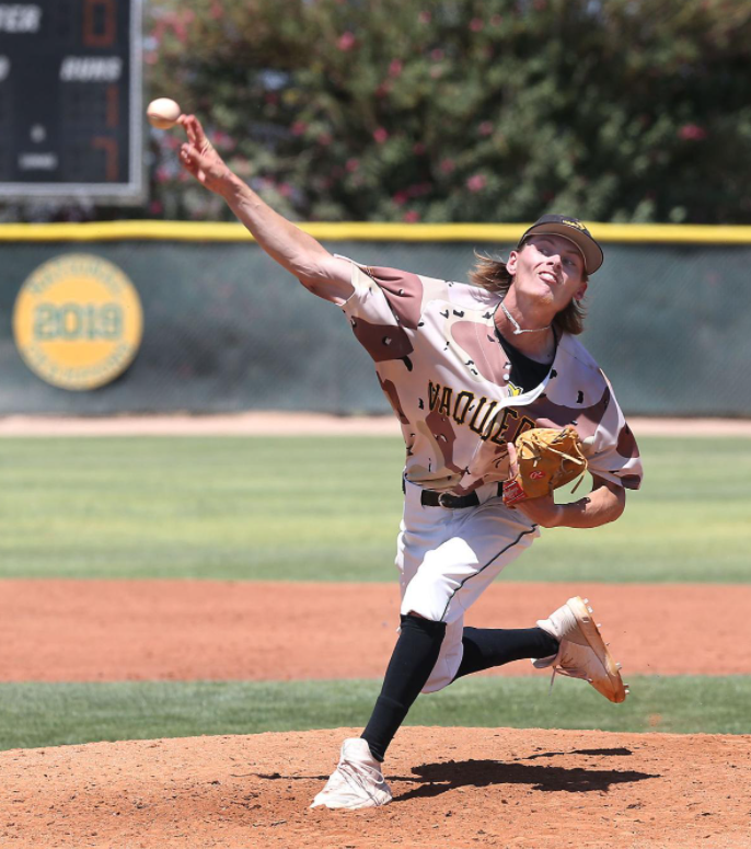 Shane Spencer strikes out 12 of 15 batters and gives up only an infield chopper base hit in Vaqueros season opener.